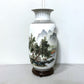 Decorative vase with a landscape design on a white background