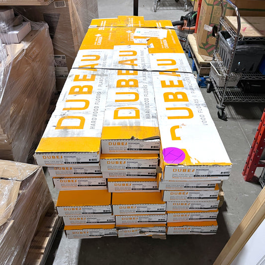 Stack of Dubeau boxes in a warehouse setting