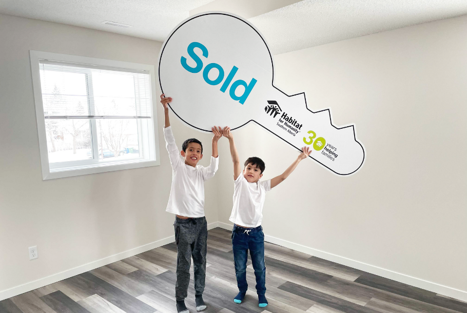 habitat for humanity southern alberta families purchasing their homes.